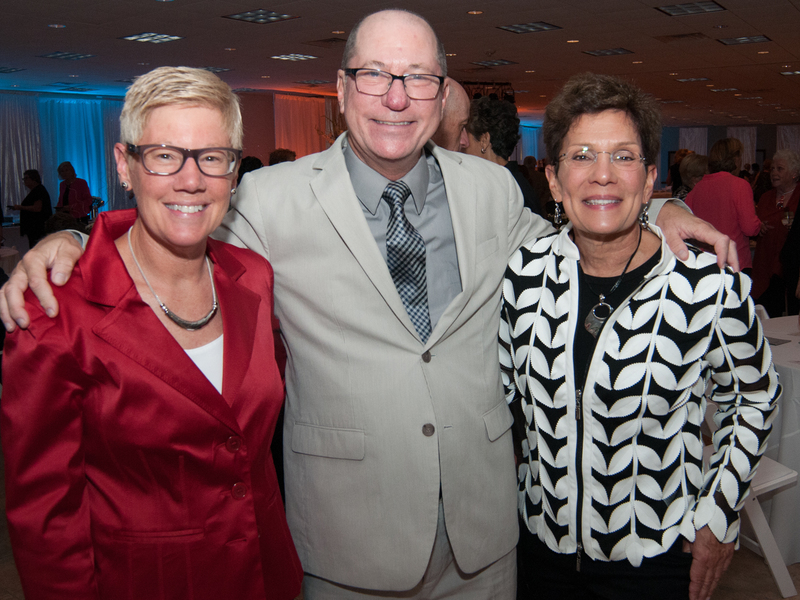 Enjoying the gala are Debbie Woods, (l-r) Bob Hoffer and Leslie Sinclair. BY DENY HOWETH